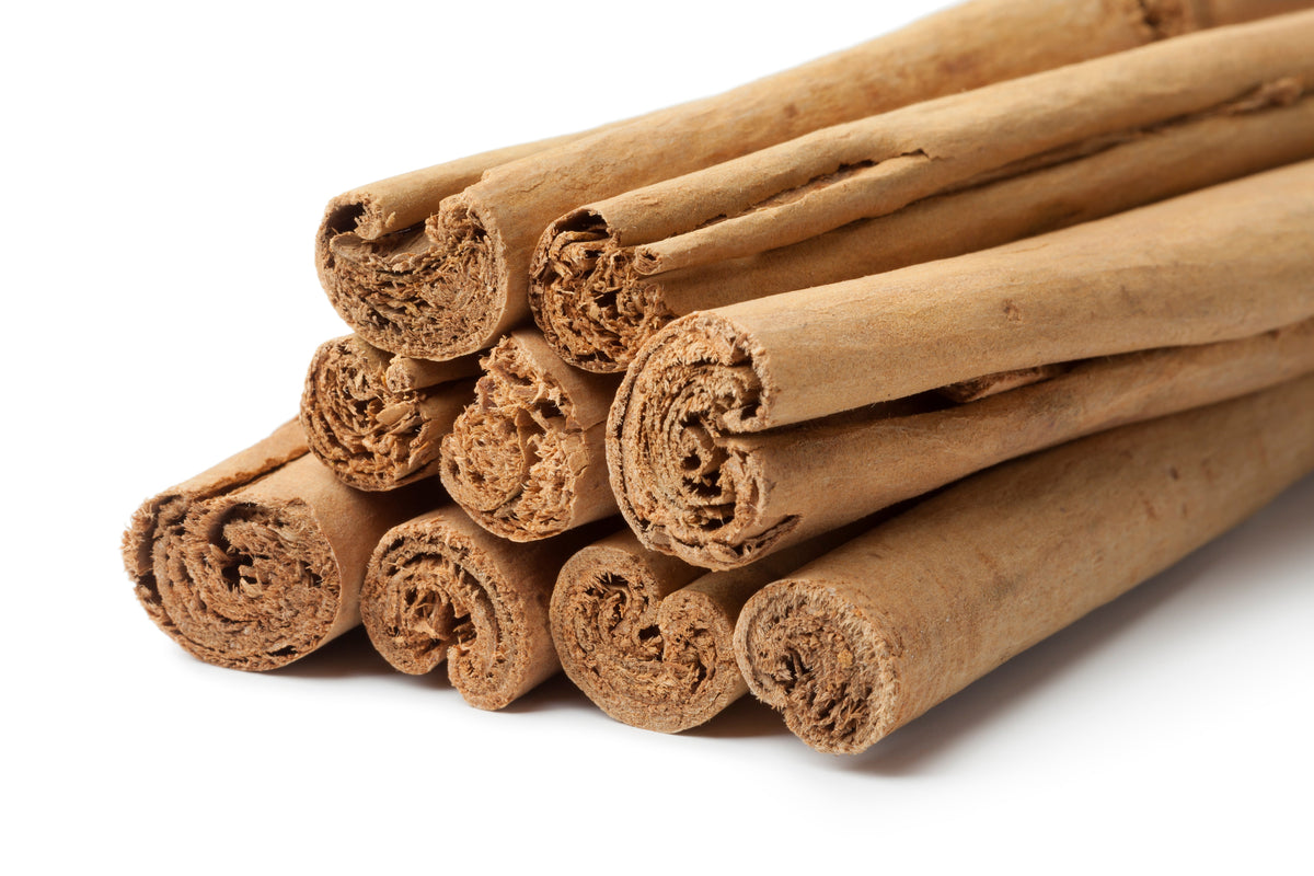 True Ceylon cinnamon sticks on white background – why real cinnamon costs more and is worth it