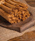 Overhead view of Ceylon cinnamon sticks and ground cinnamon – Ceylera tea ingredients