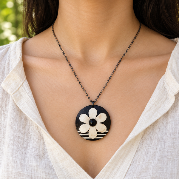 Ivory Flower Coconut Shell Pendant Necklace, worn by a woman